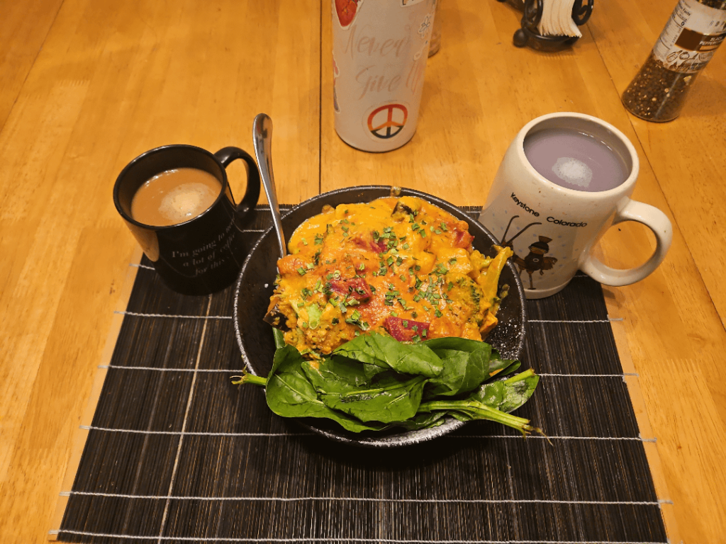 Vegan Mango Curry on top of Black Rice and spinach!(caffeine and herbal tea on side).