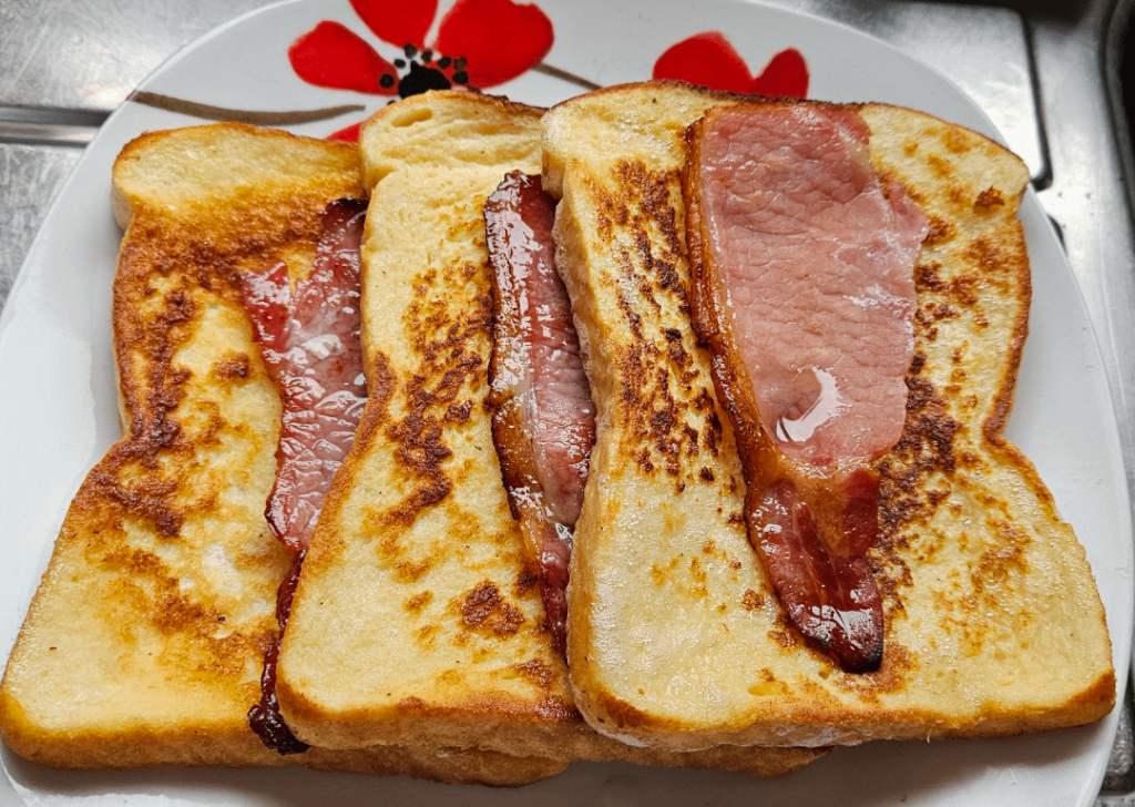 Eggy bread with oven baked bacon