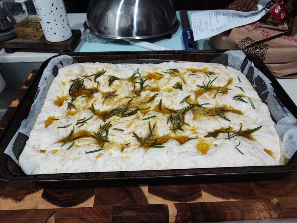 First time making Focaccia! 32 hours in the fridge, 95% hydration. Super proud of it!
