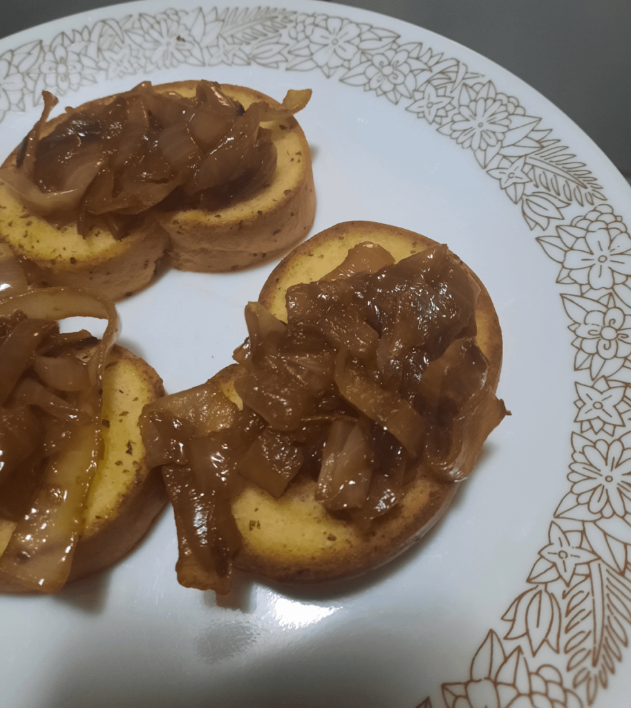 Caramelized onions on garlic toast