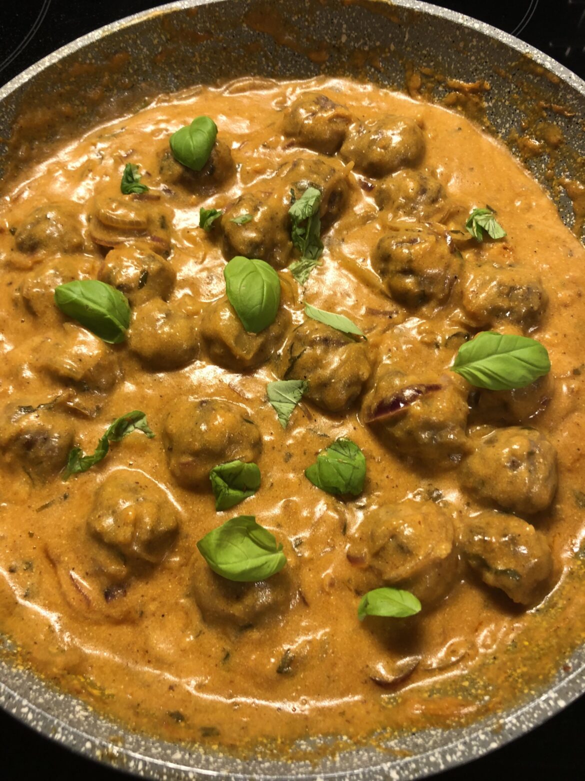 Meatballs in creamy tomato sauce