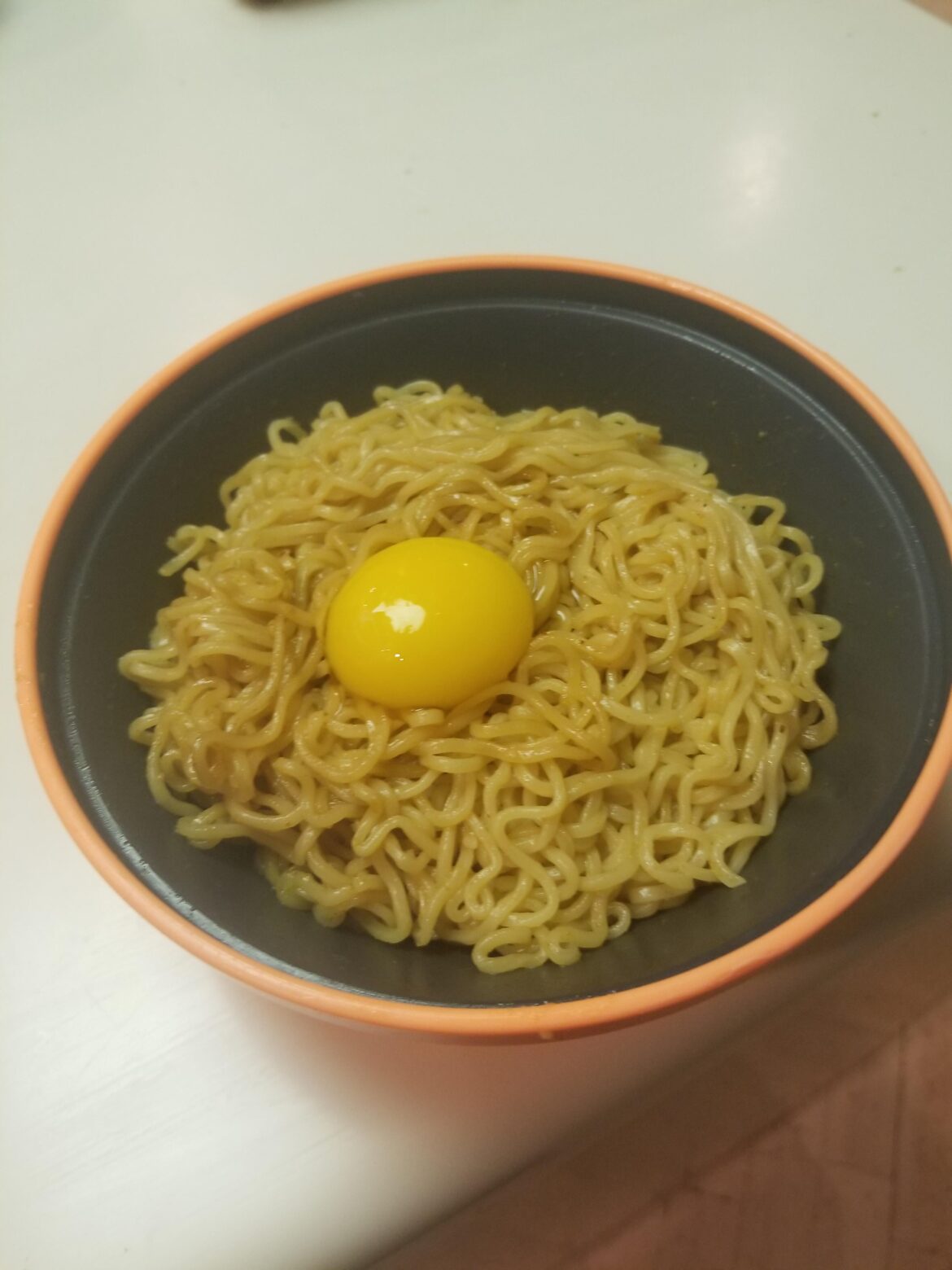 Egg yolk on my Indomie Mi Goreng noodles