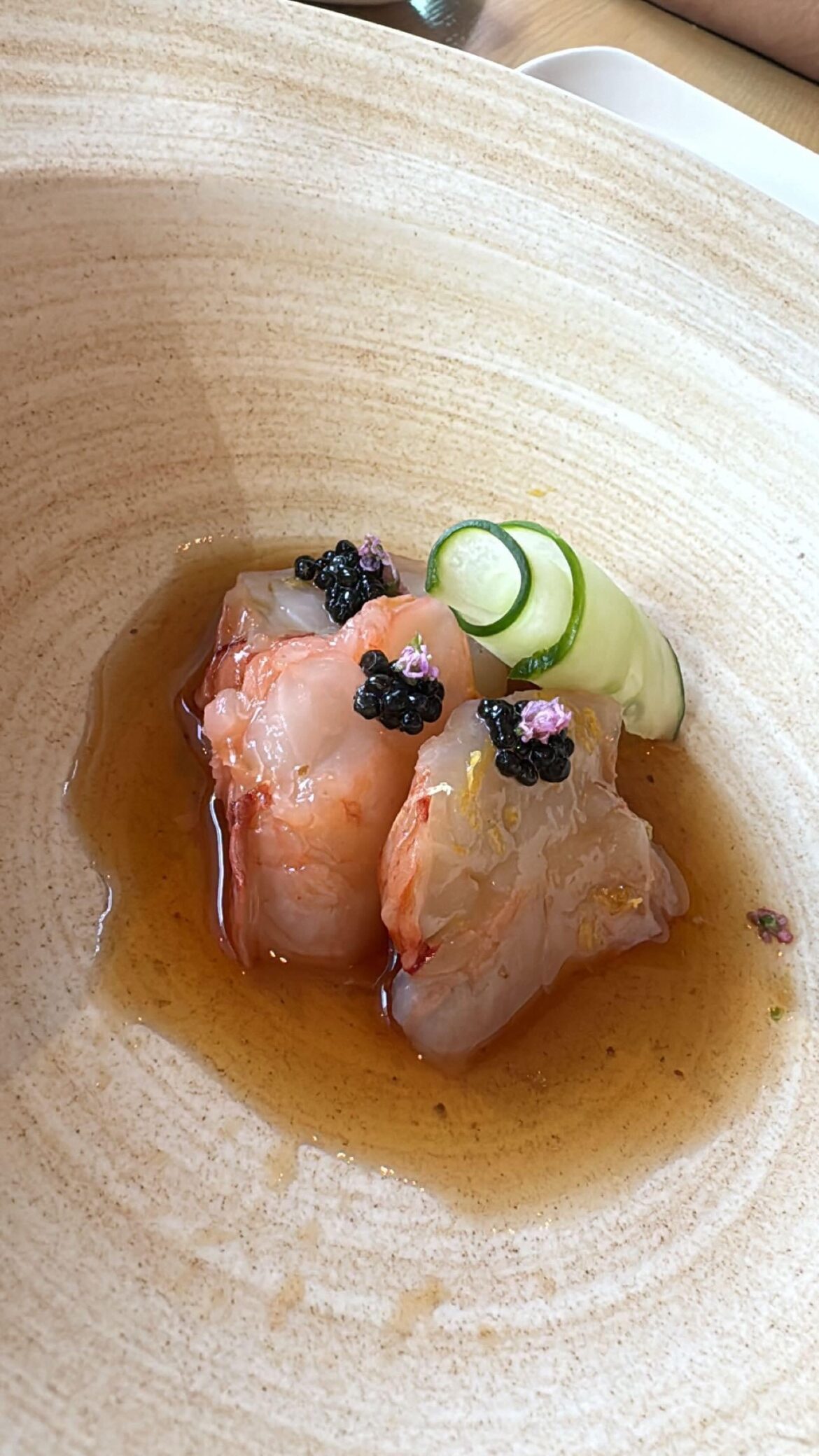 Lobster sashimi topped with caviar