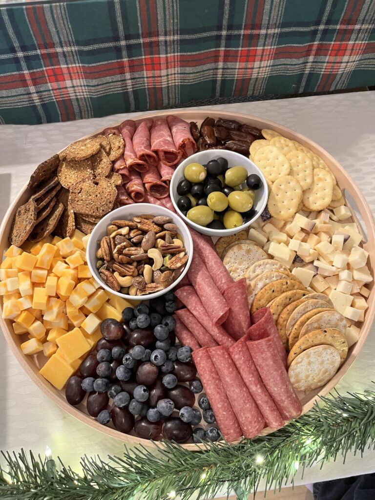 Our Christmas party spread featuring charcuterie and fruit boards