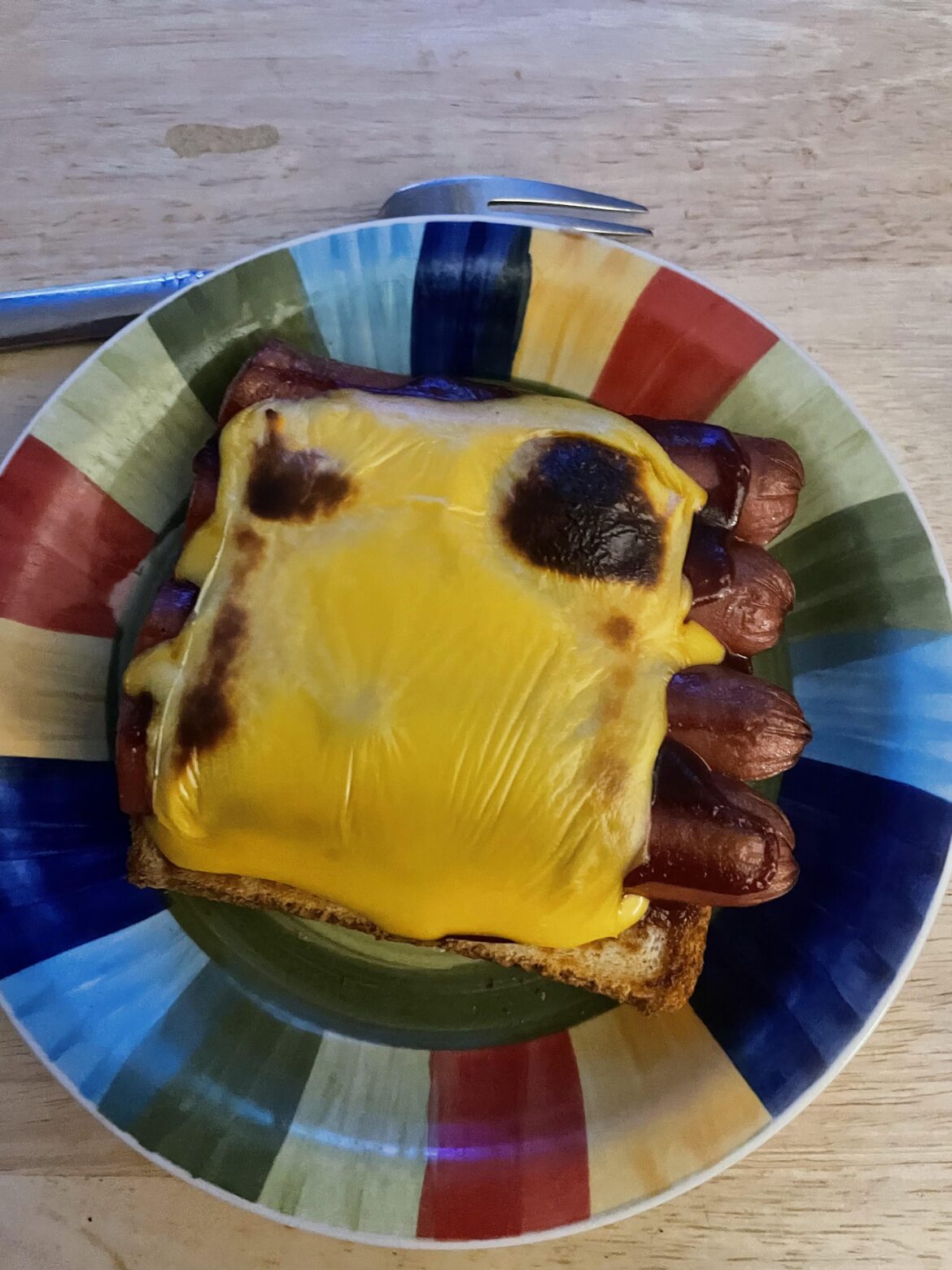 Is it an open face sandwich or a hotdog with an identity crisis?