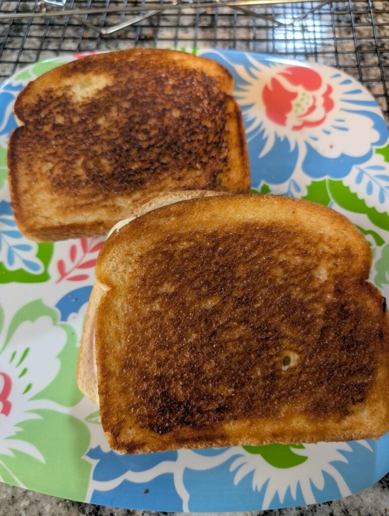 Some simple but perfectly toasted grilled cheese with tomato