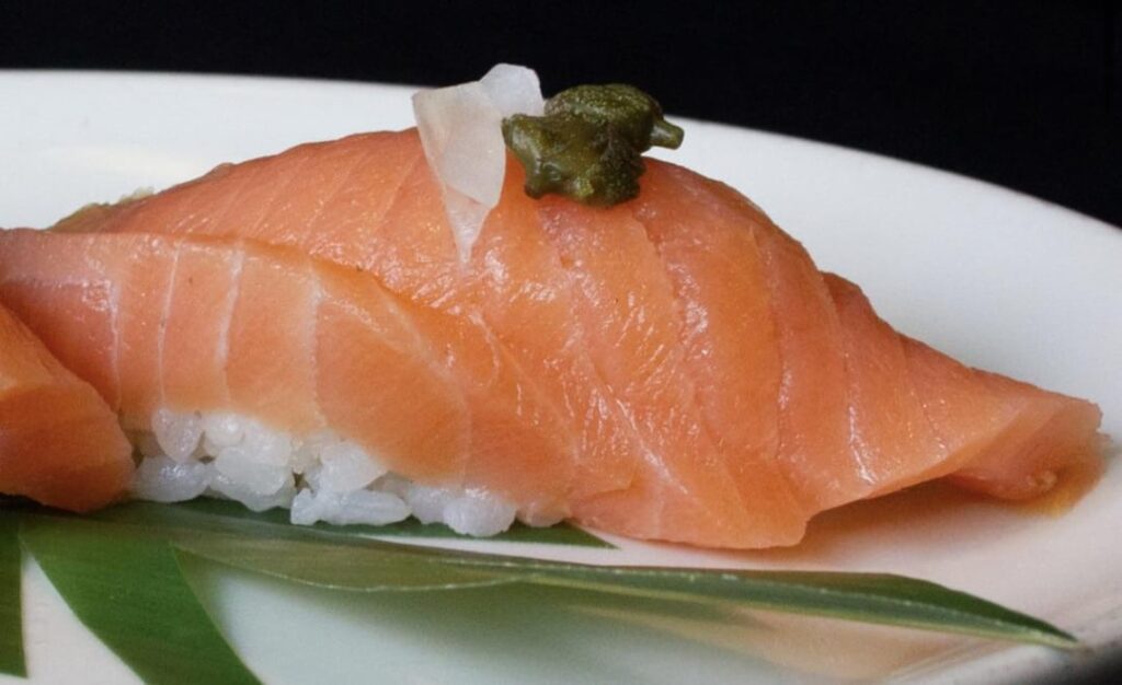 Anyone know what these green things are? (Smoked salmon nigiri)