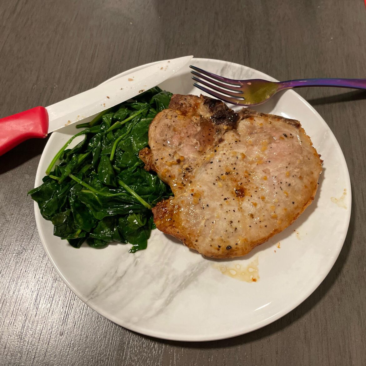 Air fried pork chop and sautéed spinach