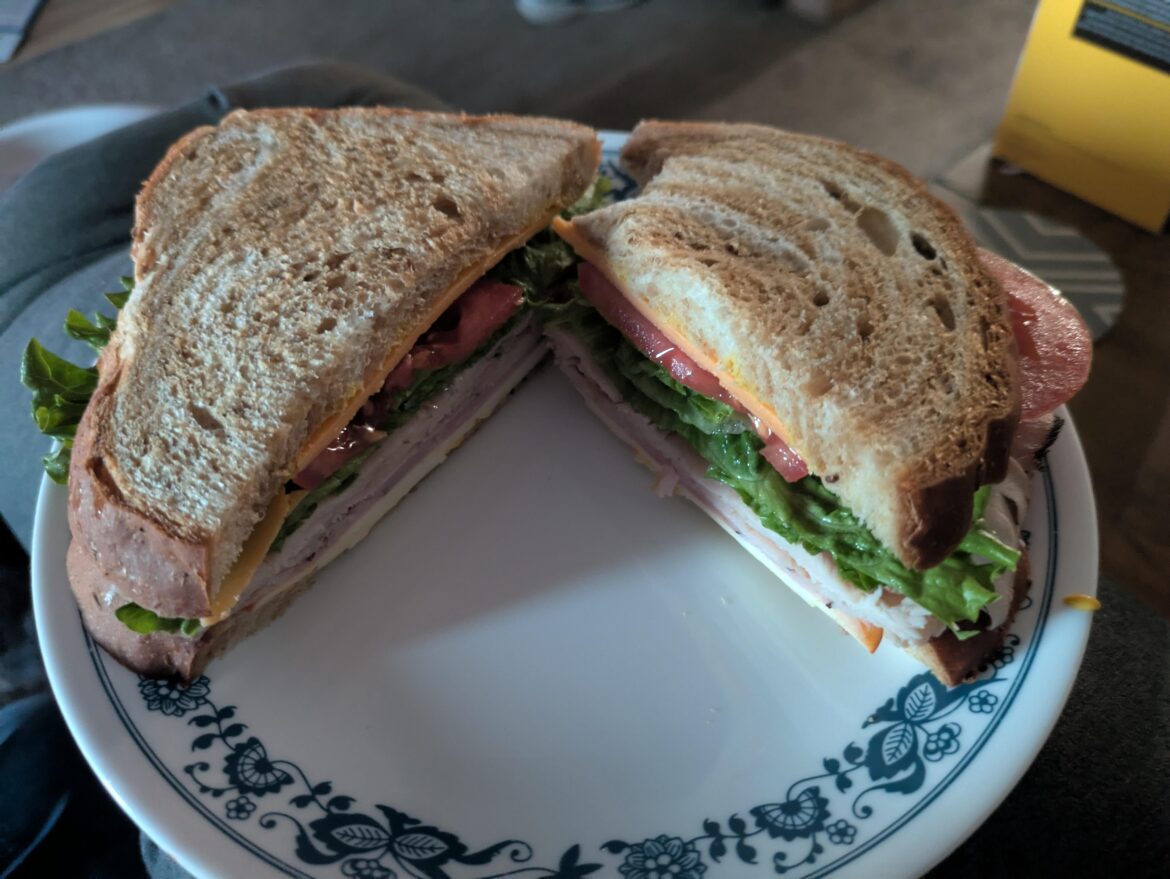 Marbled rye with pepper turkey, black forest ham, 3 cheeses and tomato/lettuce.