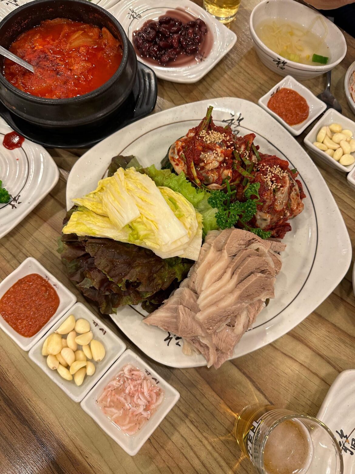 Kimchi cabbage wraps with steamed pork and oysters