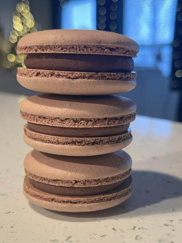 Just finished a batch of chocolate caramel macarons and I'm quite happy with them. But I keep seeing that more ruffled spread out foot on social media. Does anyone know how to achieve that? Thanks