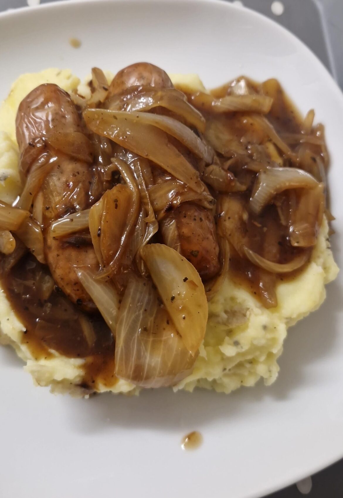 Bangers and mash with onion gravy