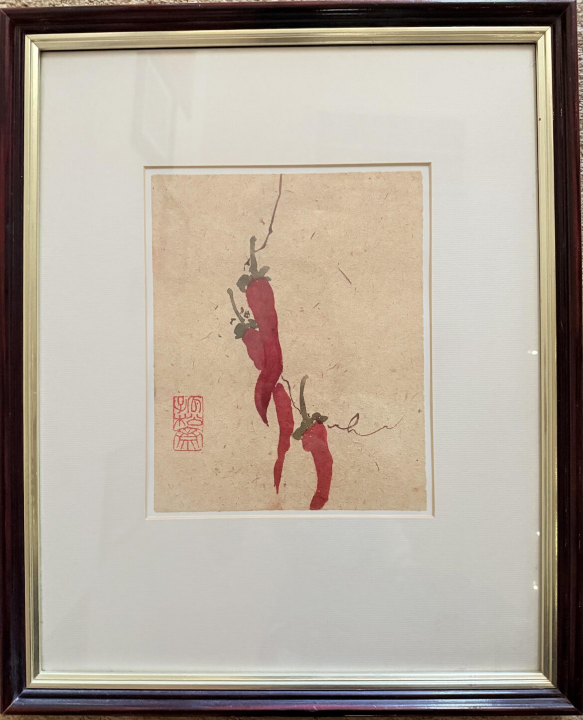 My in-laws know I have enough hot sauce so they got me a painting of chile peppers