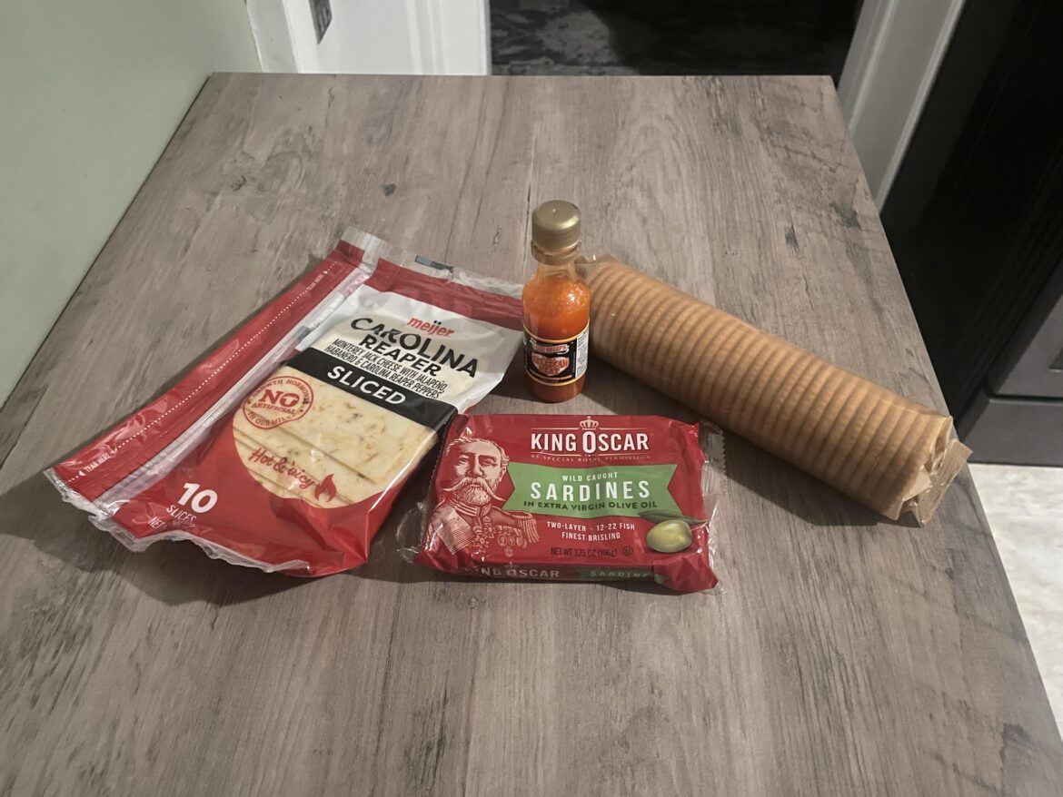 Trying sardines for the first time.