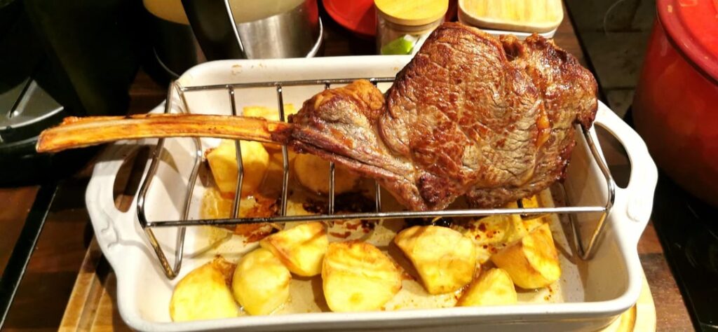 Tomahawk steak with beef fat roast potatoes