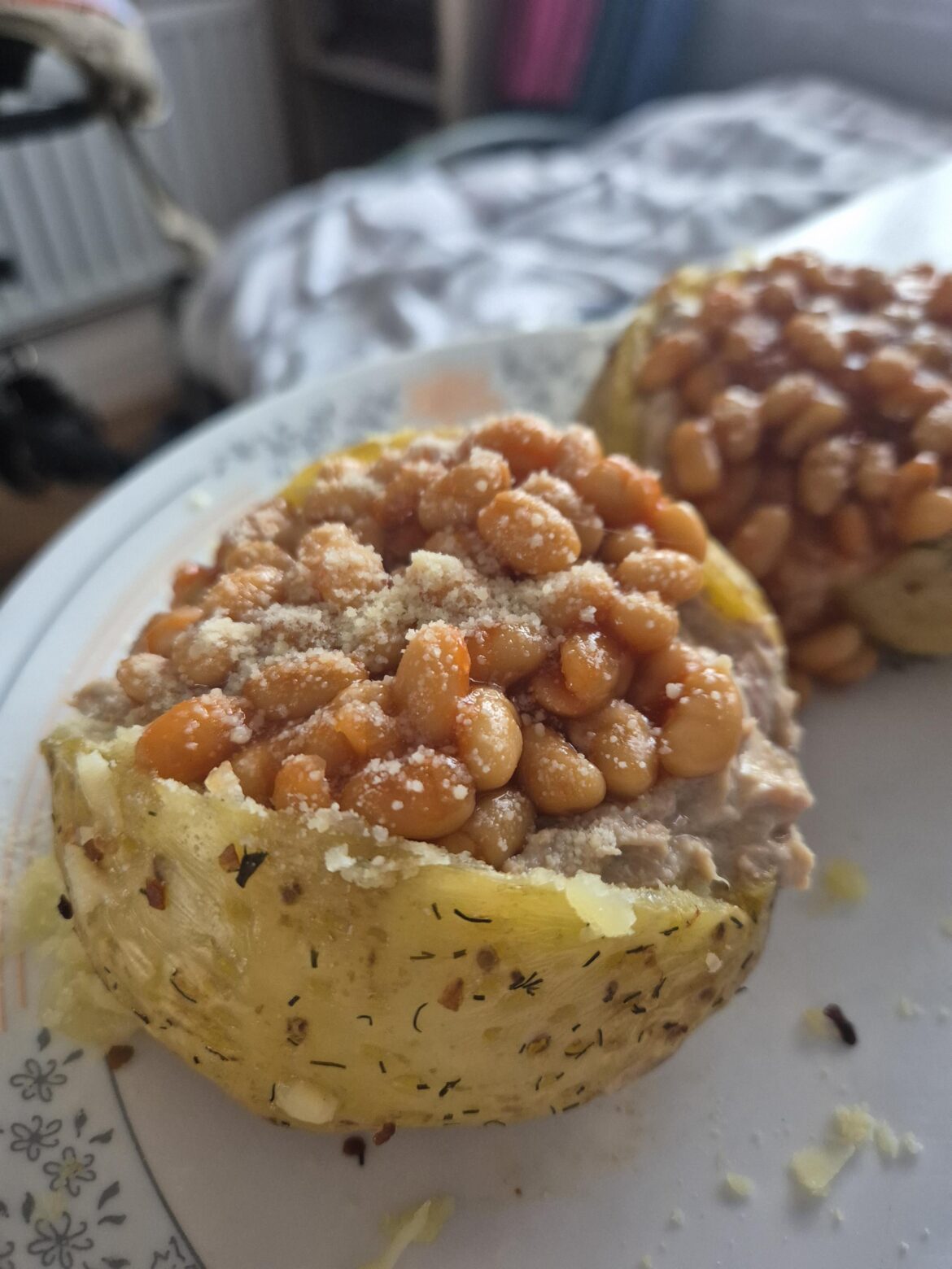 An attempt at a jacket potato with tuna and beans; sprinkled with parmesion 😋