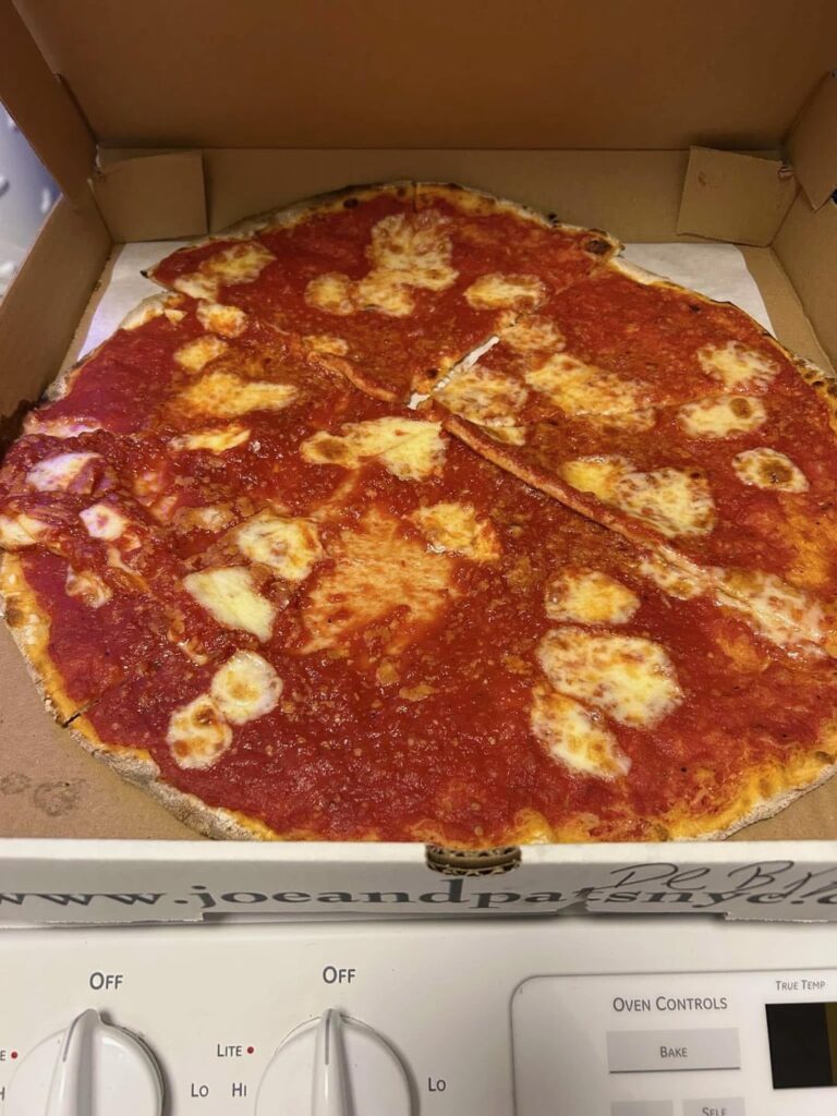 Reddit help settle an argument w my fiancé. This pizza is a crime!