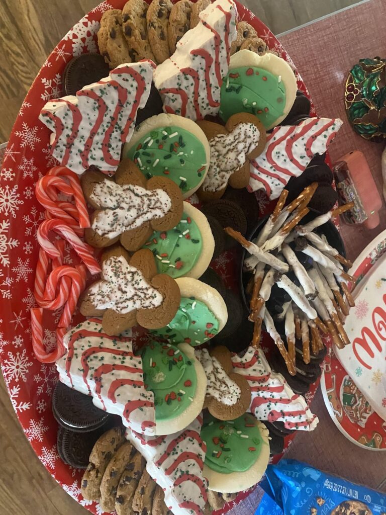 Struggling with mental health this holiday season. Opted for a ‘white trash’ cookie tray. The pretzel cigarettes were a big hit.