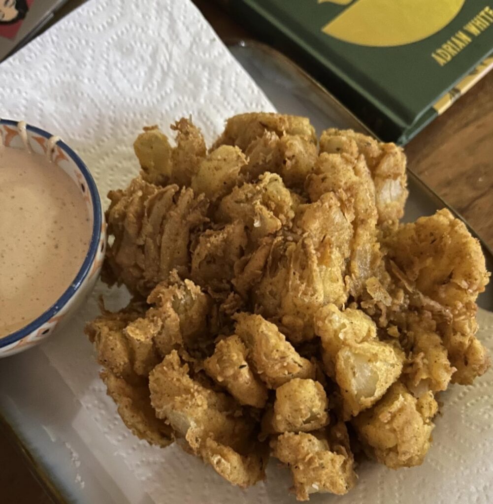 One of us posted a bloomin onion earlier, so my friend and I made one at home tonight.