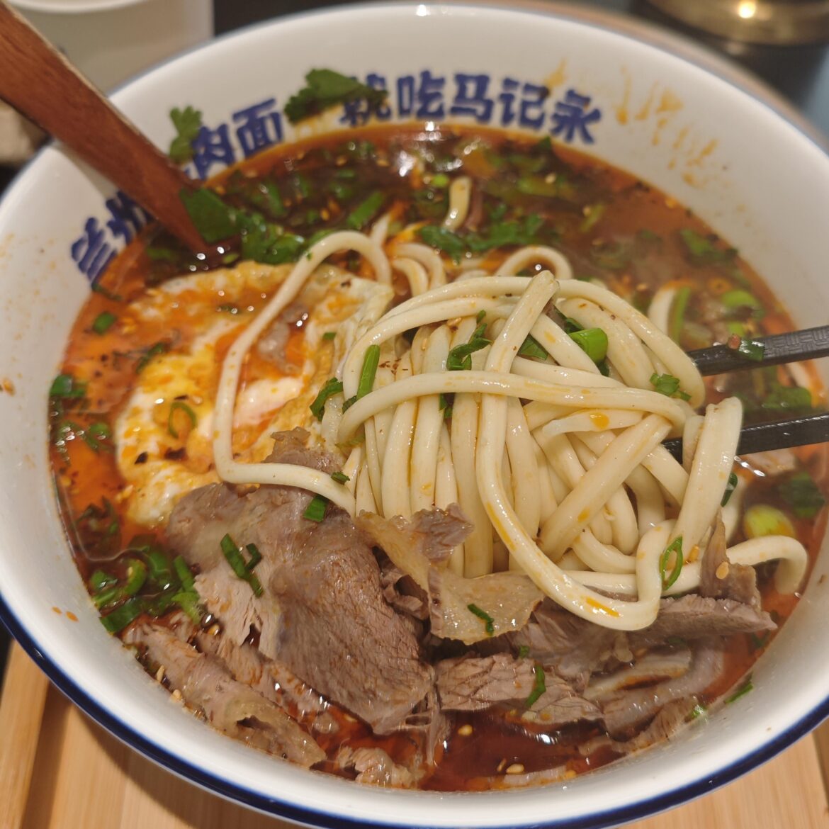 [i ate] Hand-made noodle with sliced beef and egg