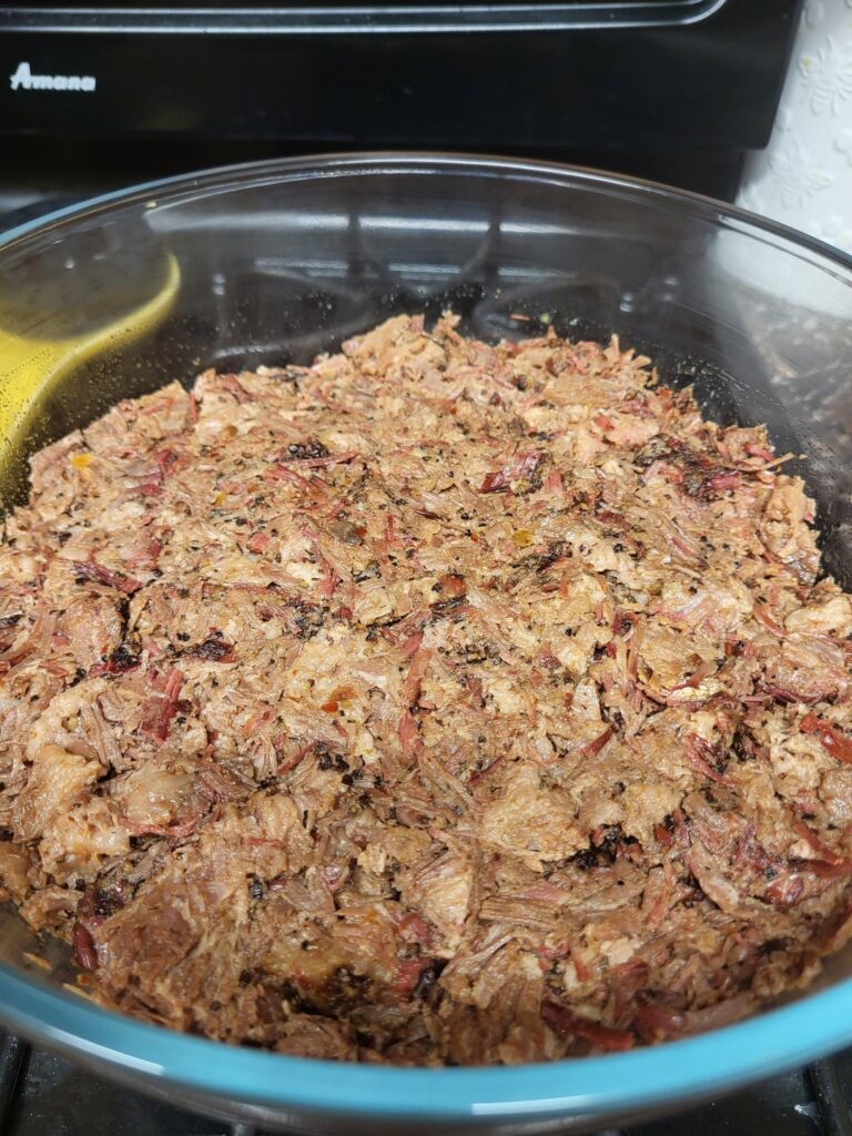 Pulled Smoked Brisket finished in Birria.