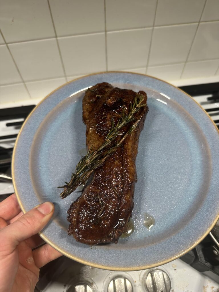 First time cooking a real steak. Is this more rare or medium rare?