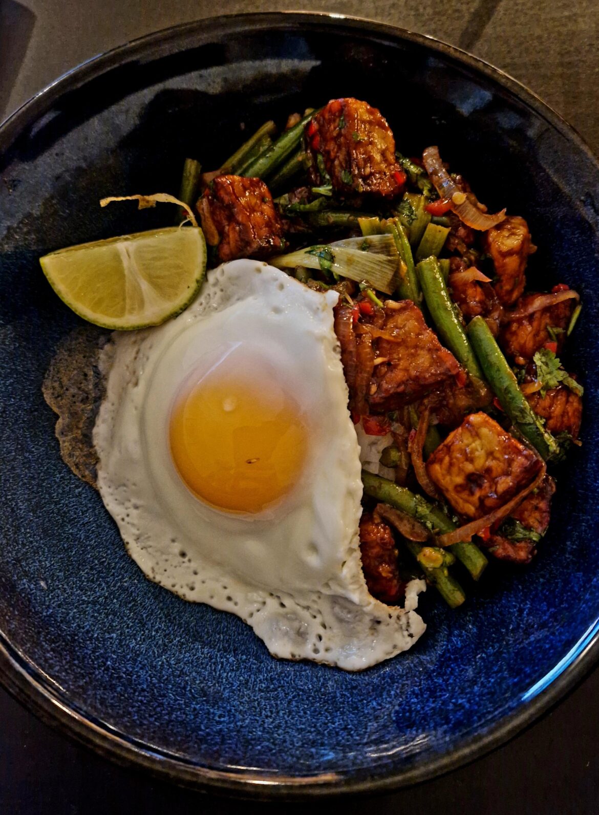 Made tempeh oprek but 100% not vegan, put an egg on it