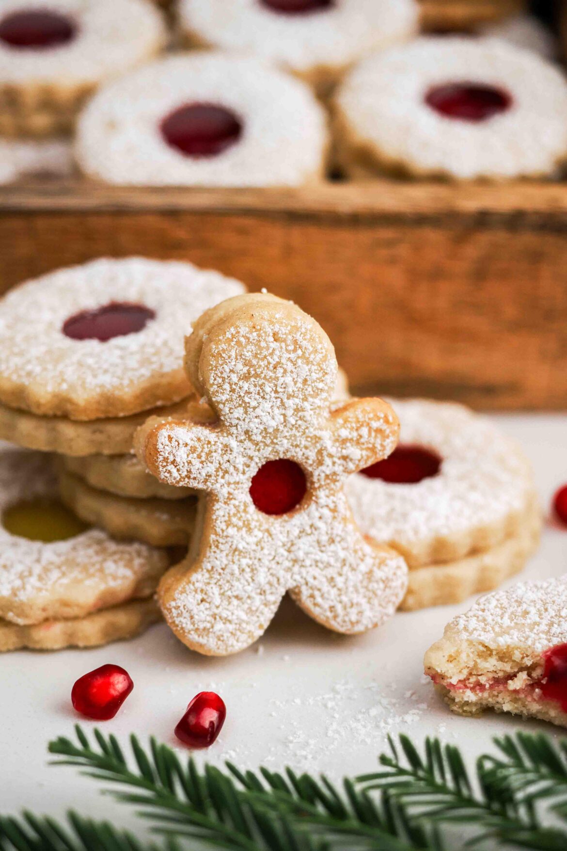 I made some of my Linzer cookies into little gingerbread men with jam-filled bellies 🥹