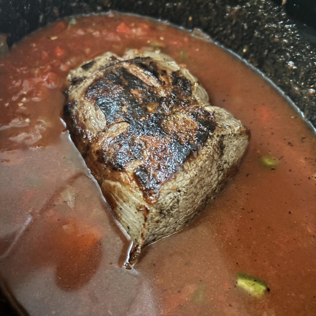Slow cooked, chili chuck roast over a twice baked potato!