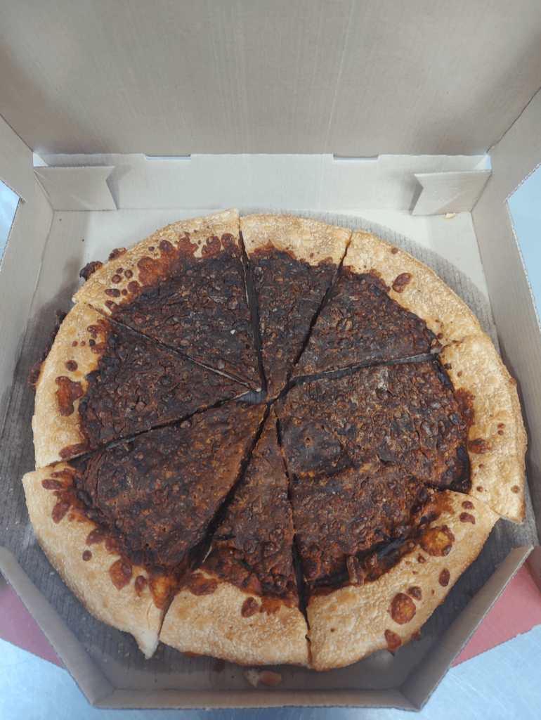 An unclaimed pizza was accidentally left in the warmer...