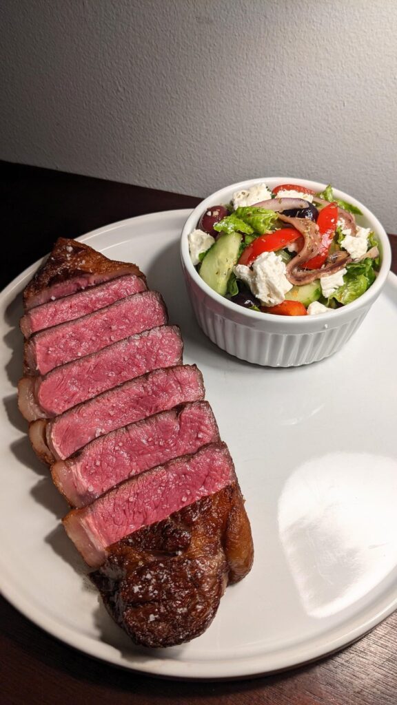 Prime Strip with side Greek Salad Prime Strip with side Greek Salad