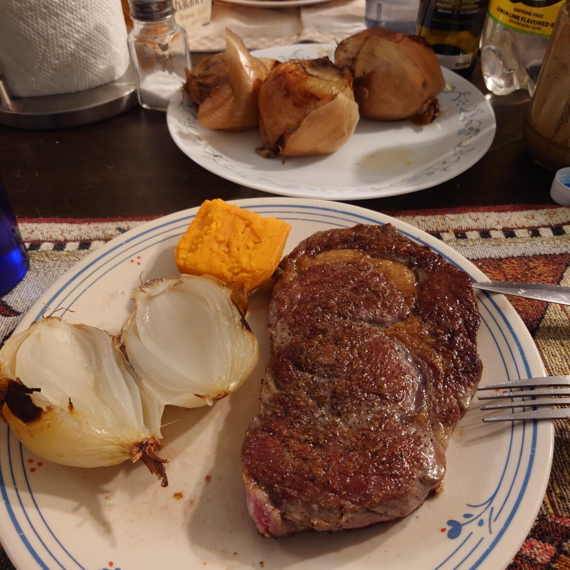 Roast Onions à la Townsends, seared ribeye, and boiled sweet potato