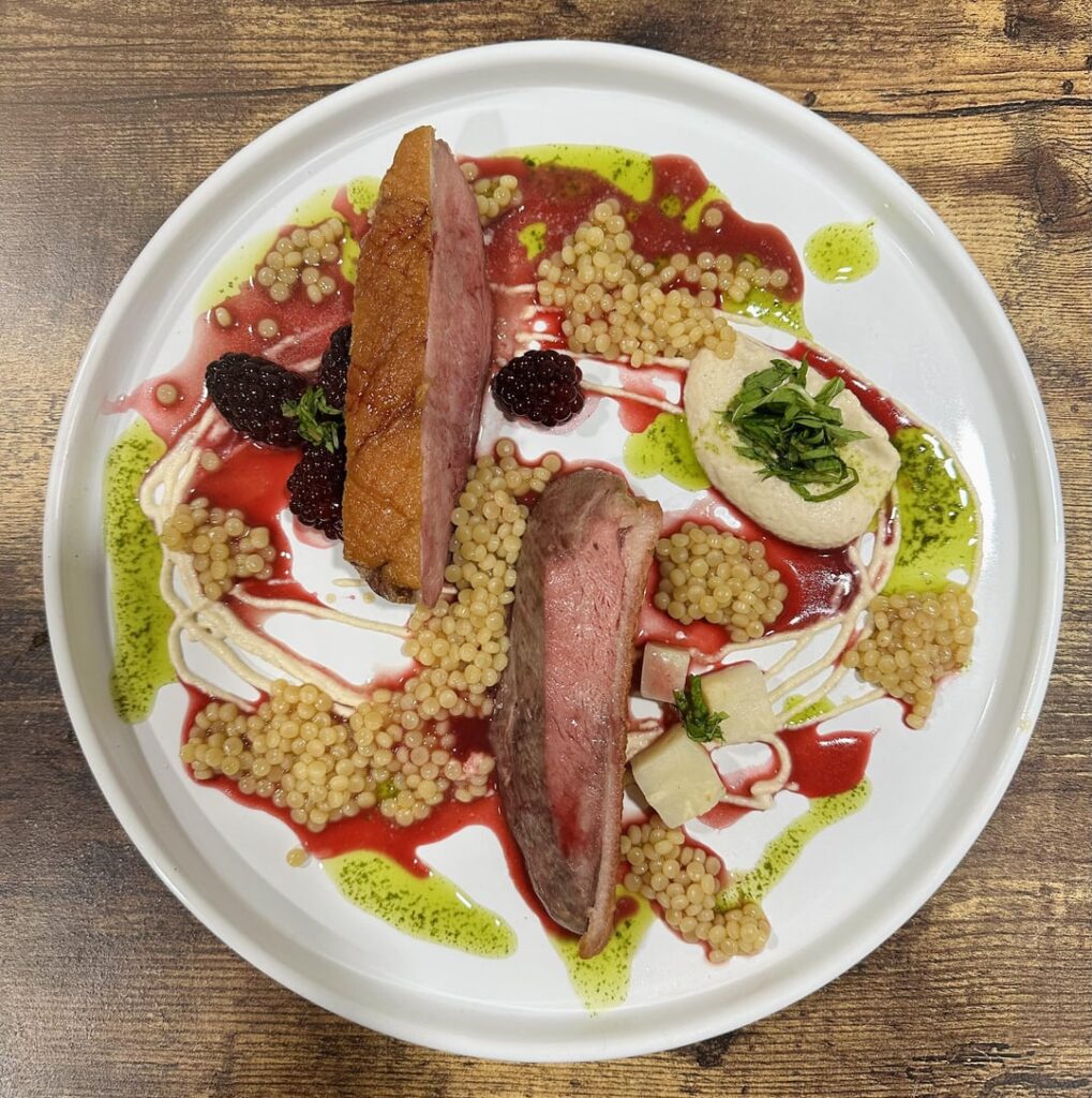 Duck breast, blackberry gastrique, hazelnut celeriac purée, pearl cous cous, mint oil