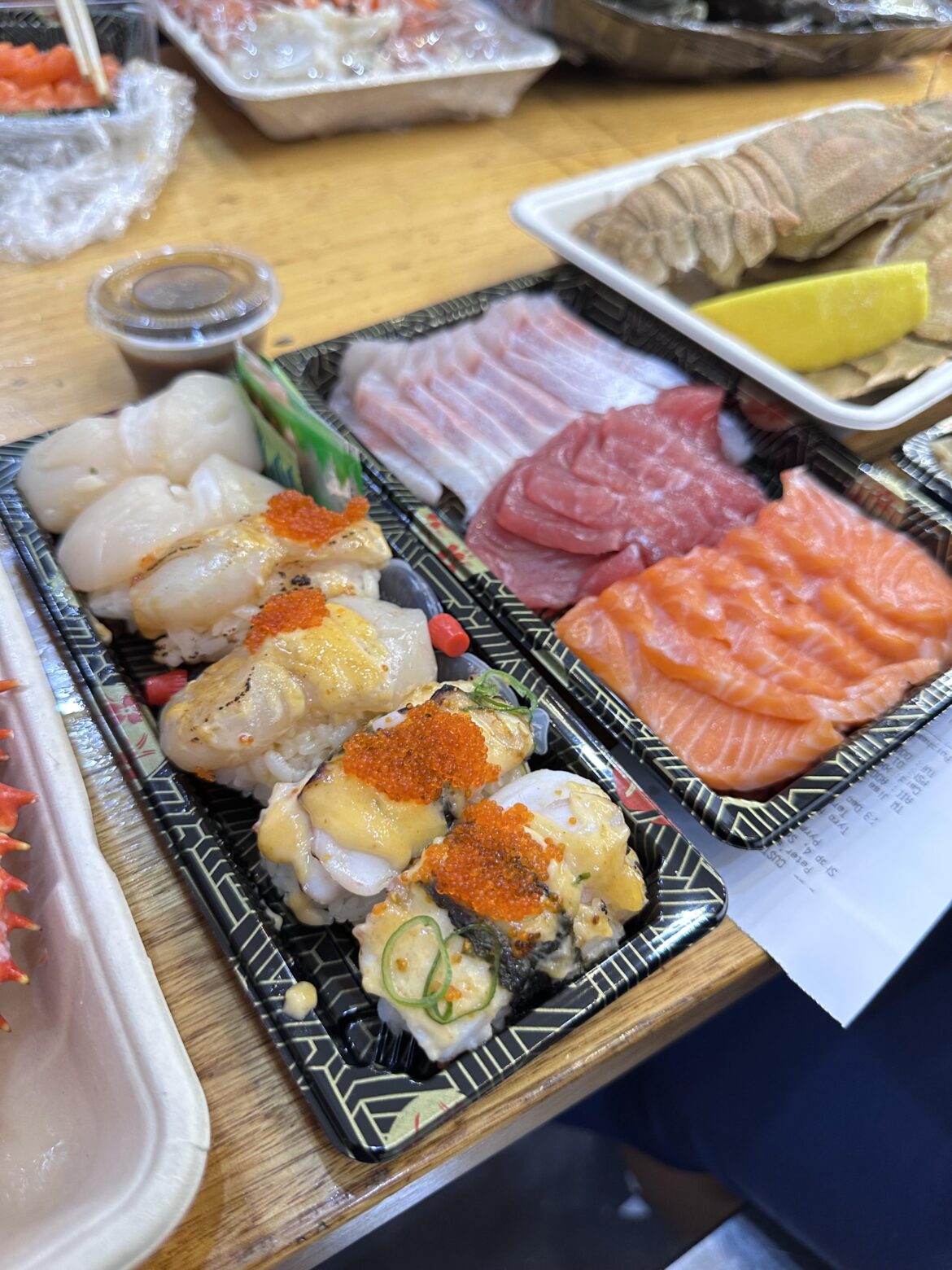 Octopus, Raw and Grilled Scallops Onigiri. Sliced Kingfish, Tuna and Salmon. Sydney Fish Market.