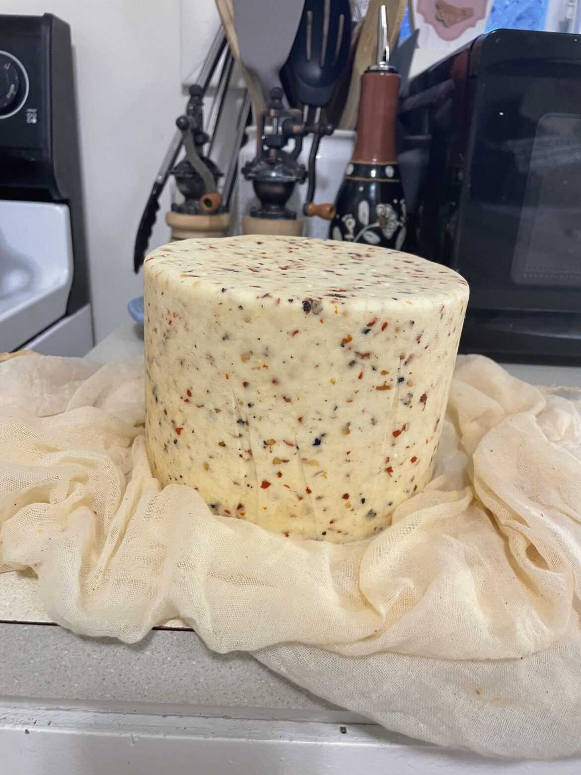 Fresh of the press, Red and Black Pepper Jack!