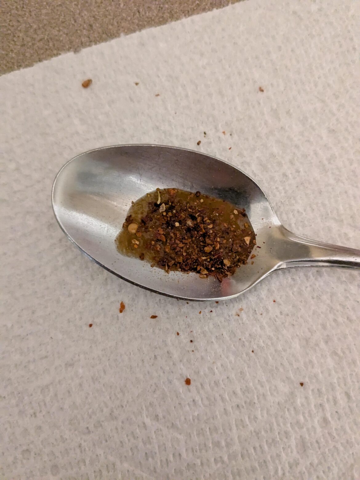 When you're bored and you just want something hot. Gator sauce with Carolina Reaper flakes.