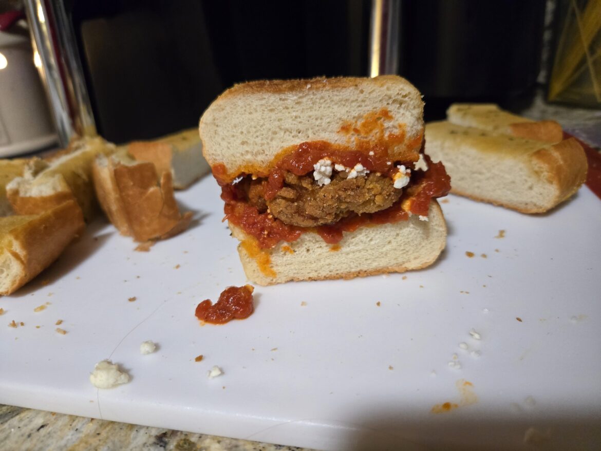 Chicken Parmesan On the Fly: Lidl Garlic Bread, Lidl Chicken Strips, Lidl Marinara, Shredded Parmesan and a sprinkle of Feta. Brought to you by White Claw, Leftovers and Weed