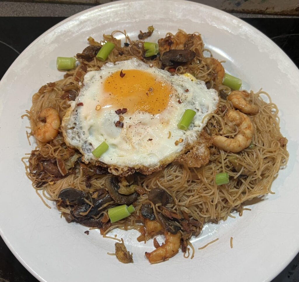 Mushroom stir fry with prawns and rice noodles