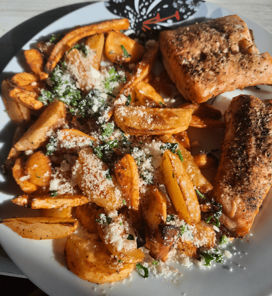 Salmon with veggies and a parmesan, parsley, garlic mix