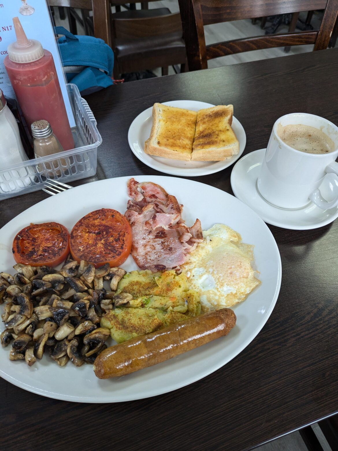 Enjoy Cafe, Bruce Grove London. £6.80 including toast and coffee. Lovely bubble & squeak.