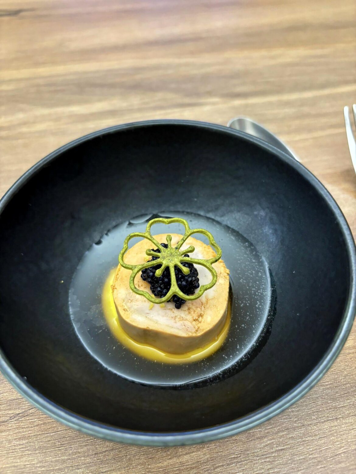 Ankimo, pumpkin coulis, ponzu broth, caviar and pumpkin tuile