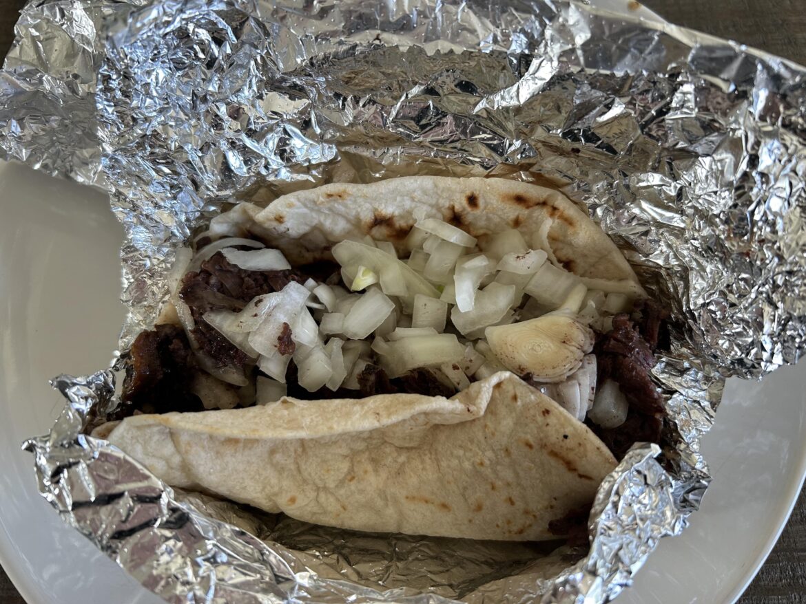 I asked for extra onions, local taco joint did not disappoint