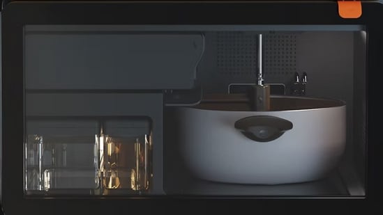 Bengaluru-based firm makes cooking robot for Indian dishes. Guess how much it costs | Bengaluru The robot integrates with a companion app, allowing users to explore recipes, plan menus, and set preferences. (NOSH)