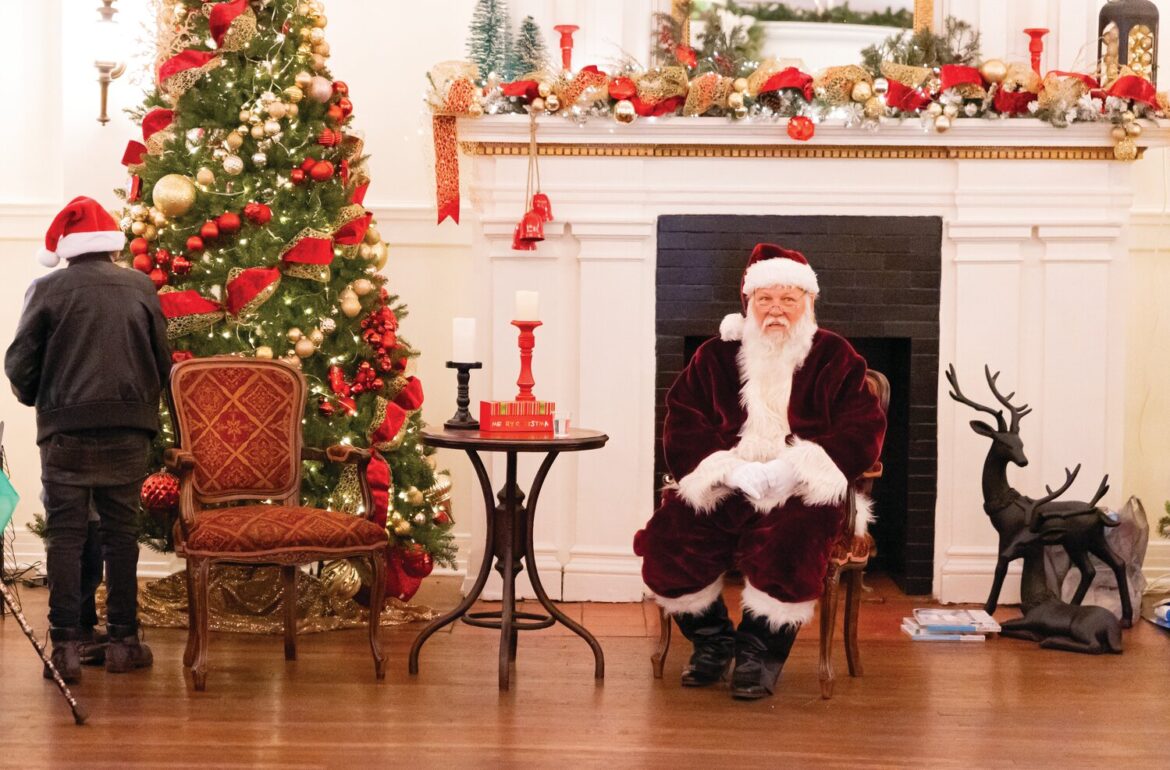 Santa greeted visitors Wednesday during the Community Christmas Dinner at the Masonic Cornerstone Events Center.