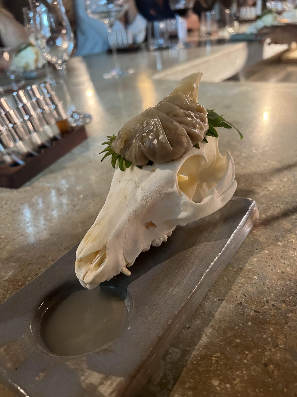 Dumpling on a skull on a board