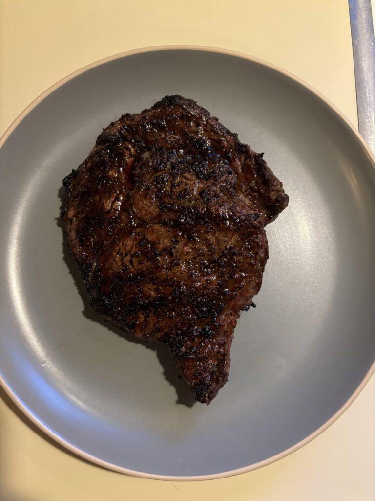 $14 HEB ribeye over charcoal
