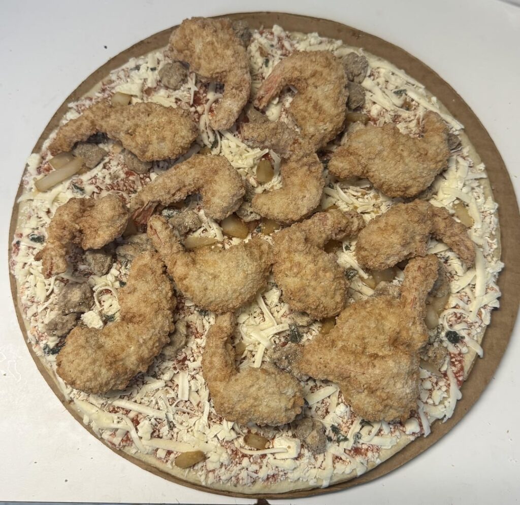 Ingredients: frozen pizza, frozen breaded shrimp, cheese. Delicious.
