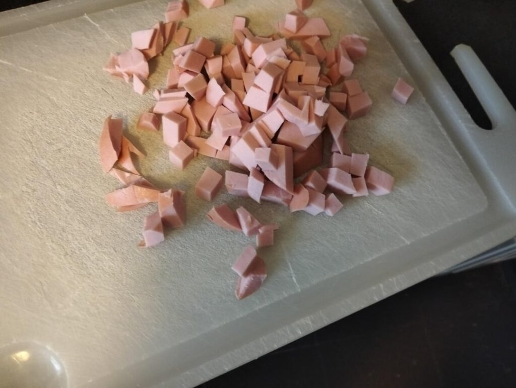 Scrambled eggs with sausages