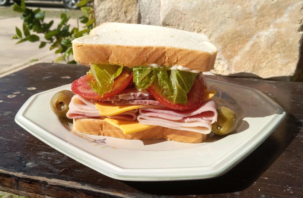 Ham, Turkey, Cotto Salami, and American Cheese on cheap squishy white bread.