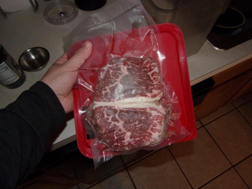 Some scraps from a picanha and chimichurri sauce